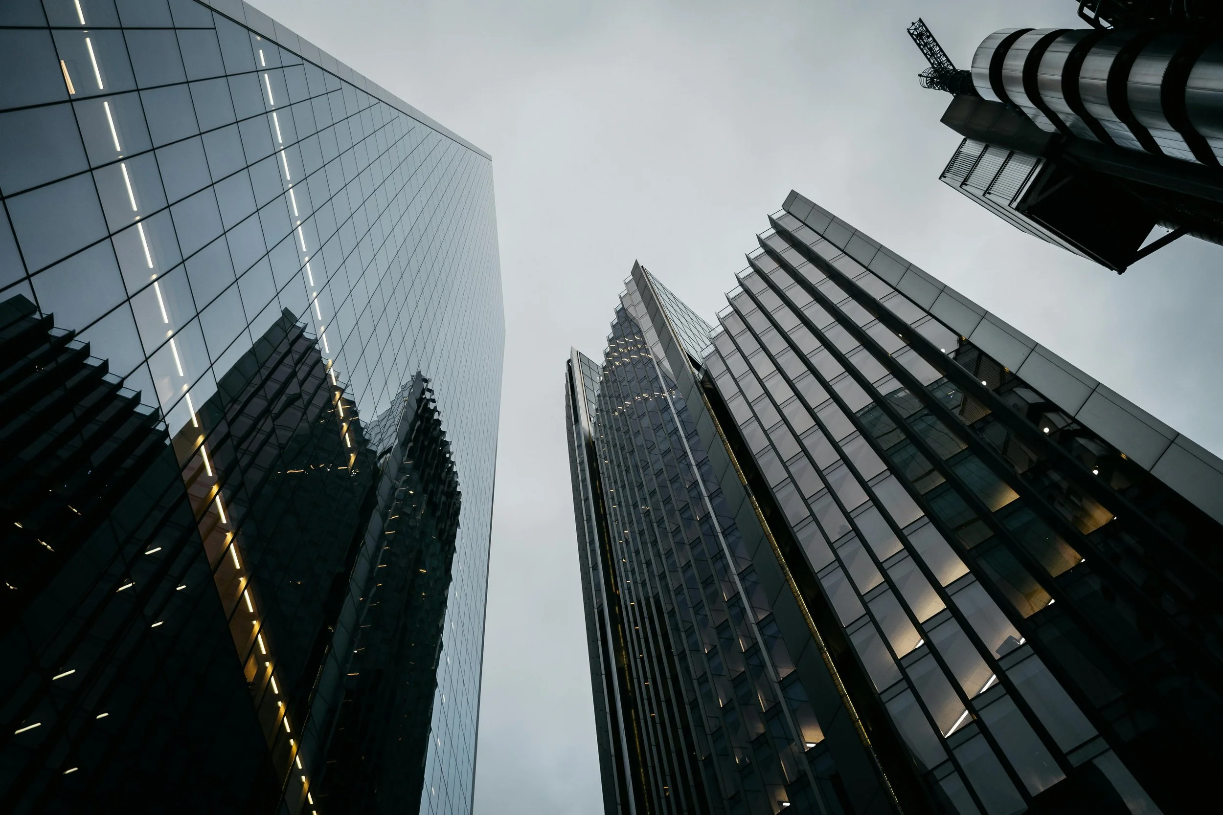 Glass office towers at dusk
